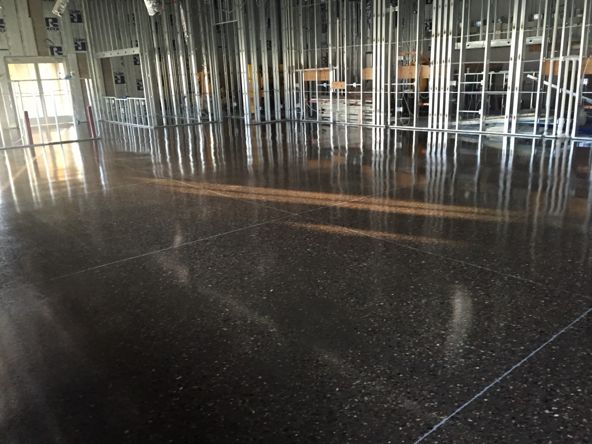 Polished concrete finish in a warehouse space