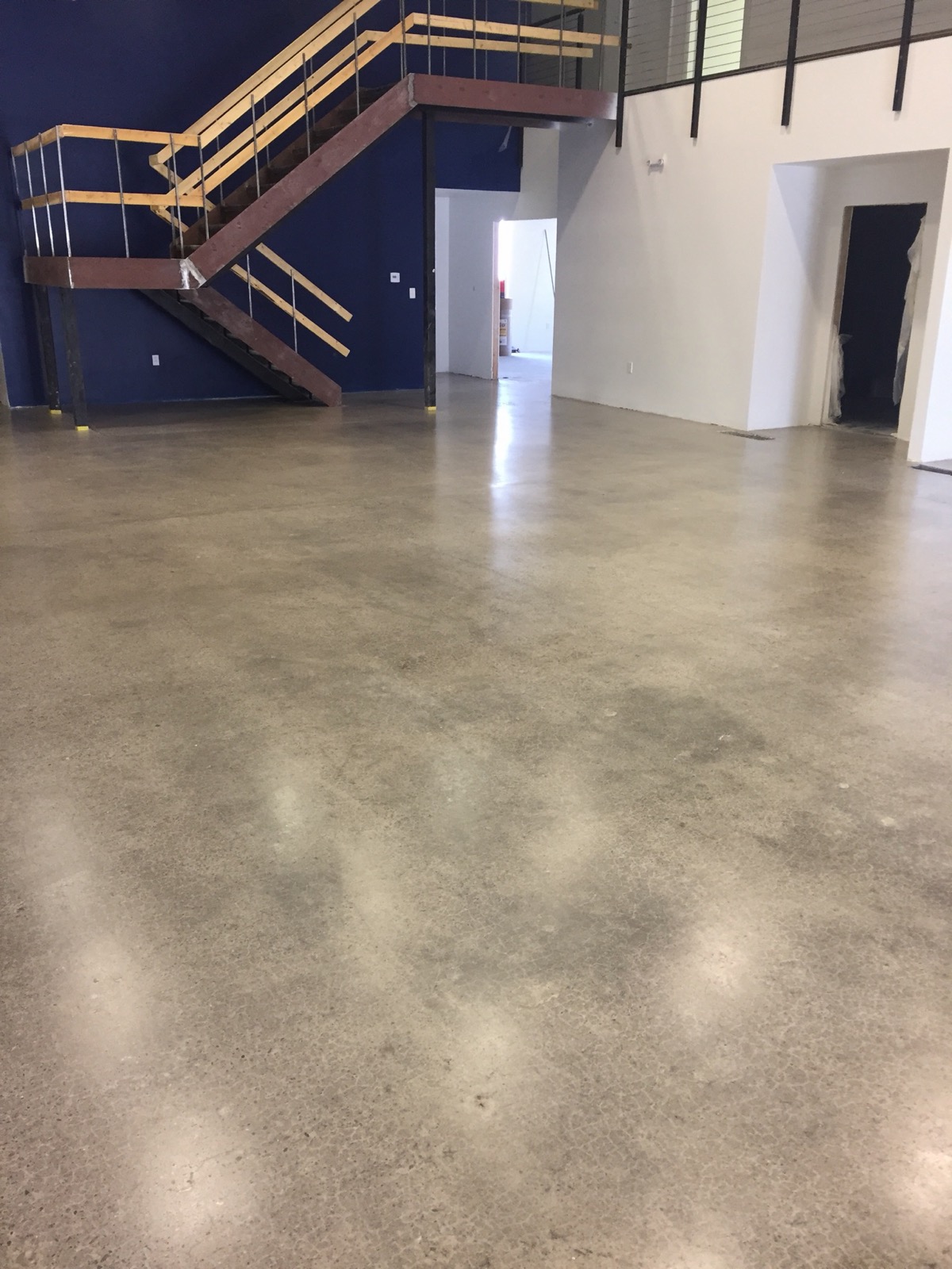 Polished concrete stair treads in a commercial interior
